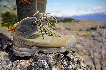 Salomon OUTward Mid GTX hiking boot (standing on rock)